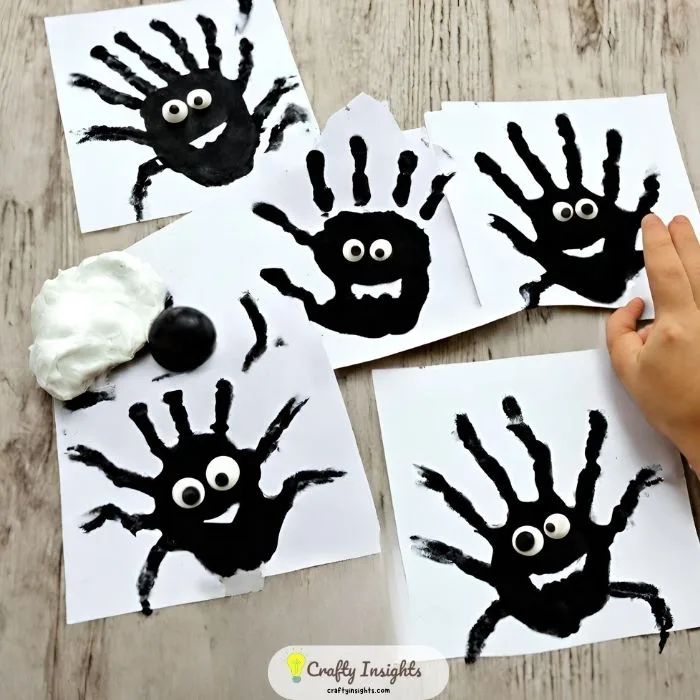 spider shapes by incorporating handprints