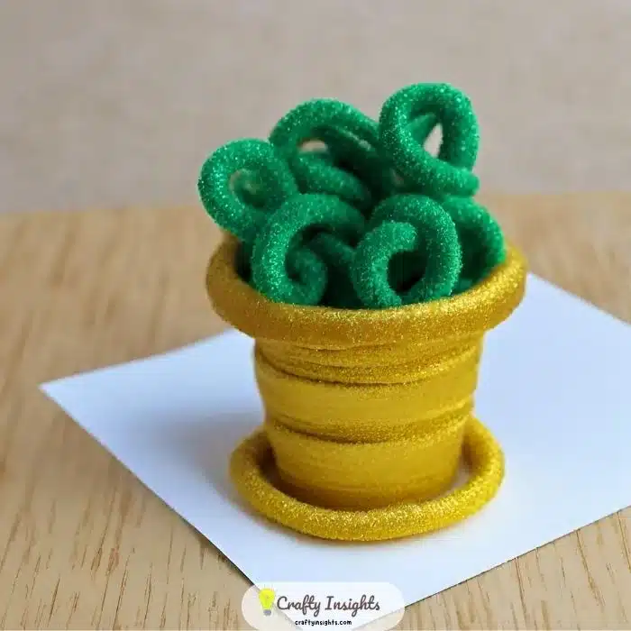 pot of gold made from coiled black pipe cleaners